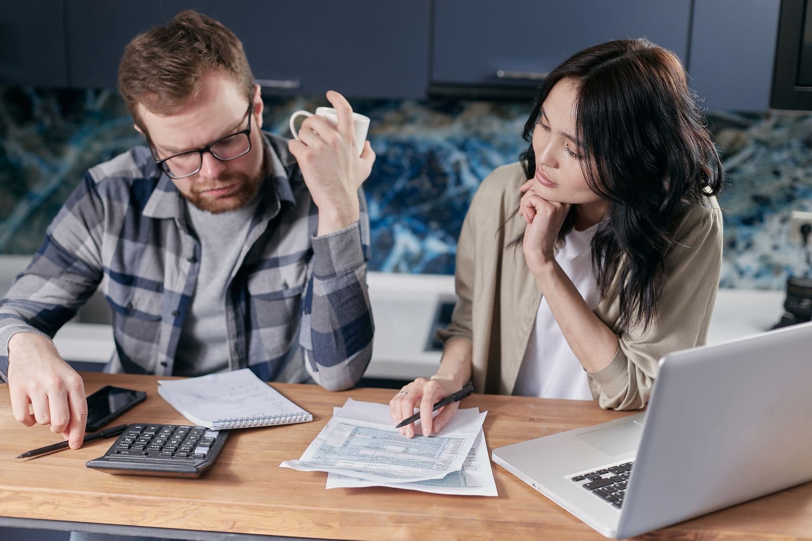 A couple reviewing their household finances together